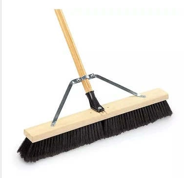 Broom to clean debris for dumpster